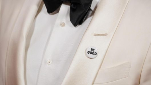 Celebrities wear pins protesting ICE on the Golden Globes red carpet