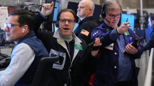 US stocks rise as gold hits another record and the dollar’s value falls
