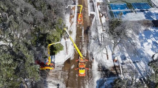 Crews race to restore power, open roads as the US South braces for another blast of dangerous cold