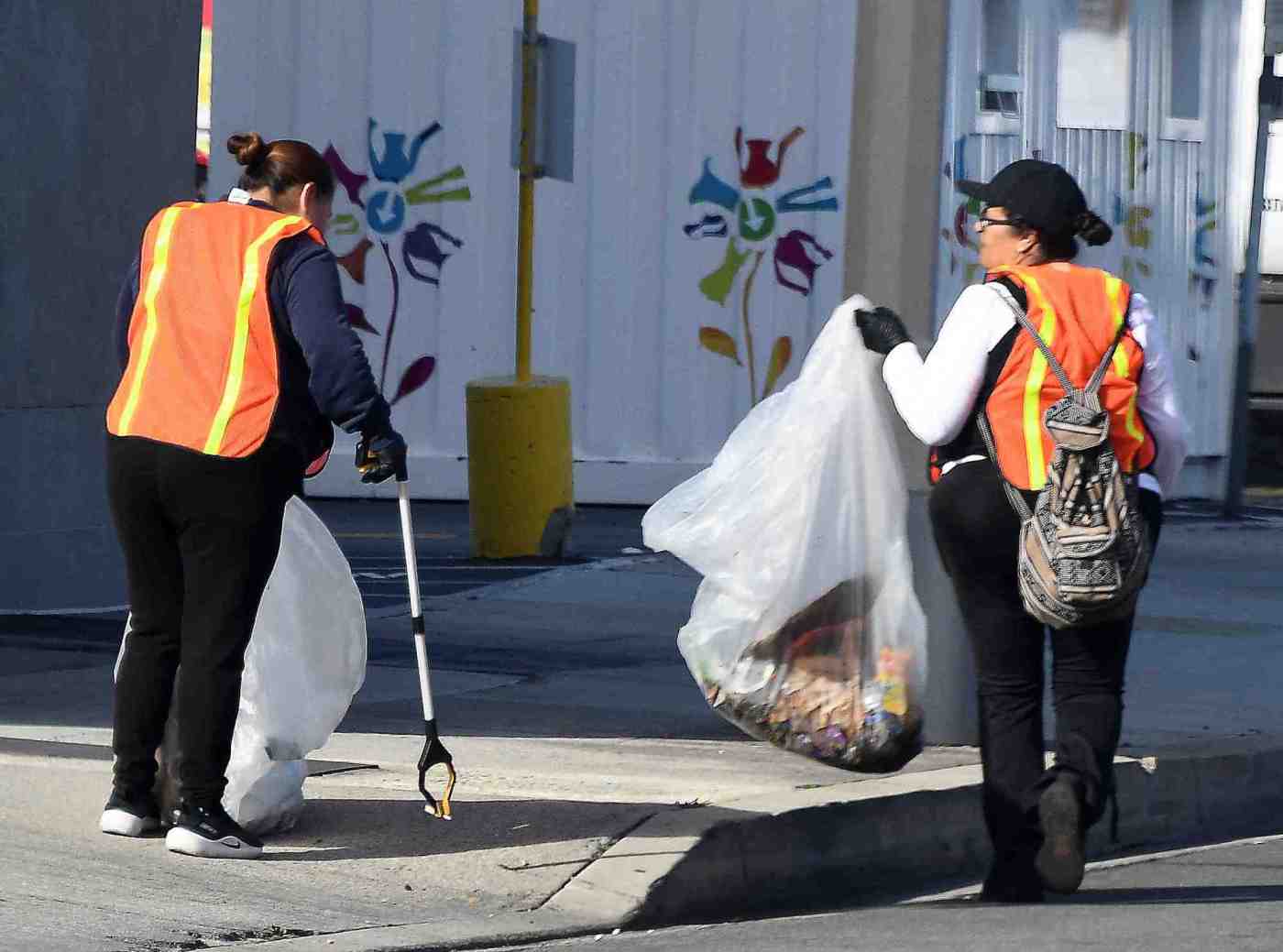 Volunteers cleaned up streets, sidewalks and alleys in Valley Plaza neighborhood