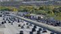 Could more speed limit signs on 15 Freeway through Cajon Pass improve traffic flow?